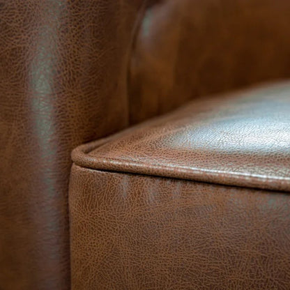 Kiersten Upholstered Swivel Barrel Chair